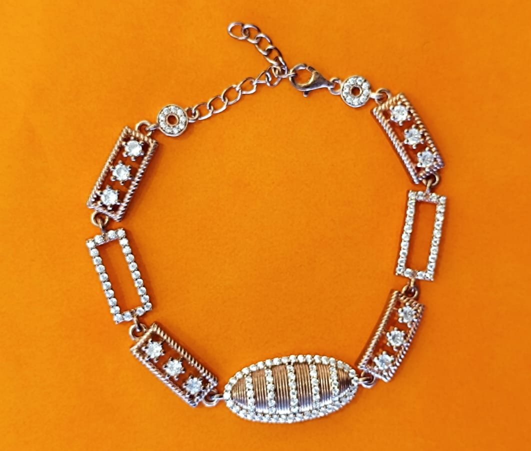 Premium cz stones with silver polish chain modal bracelet