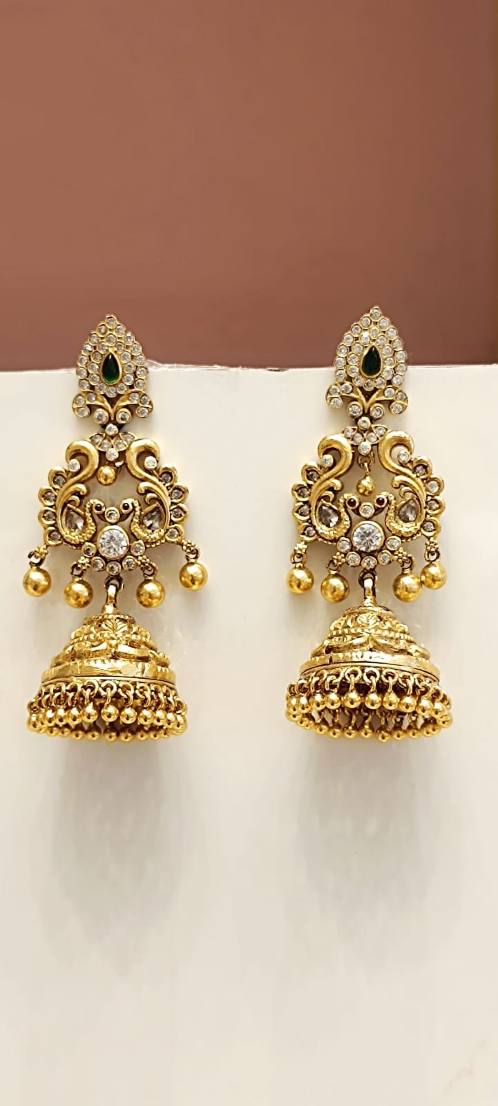 Antique Peacock Buttalu