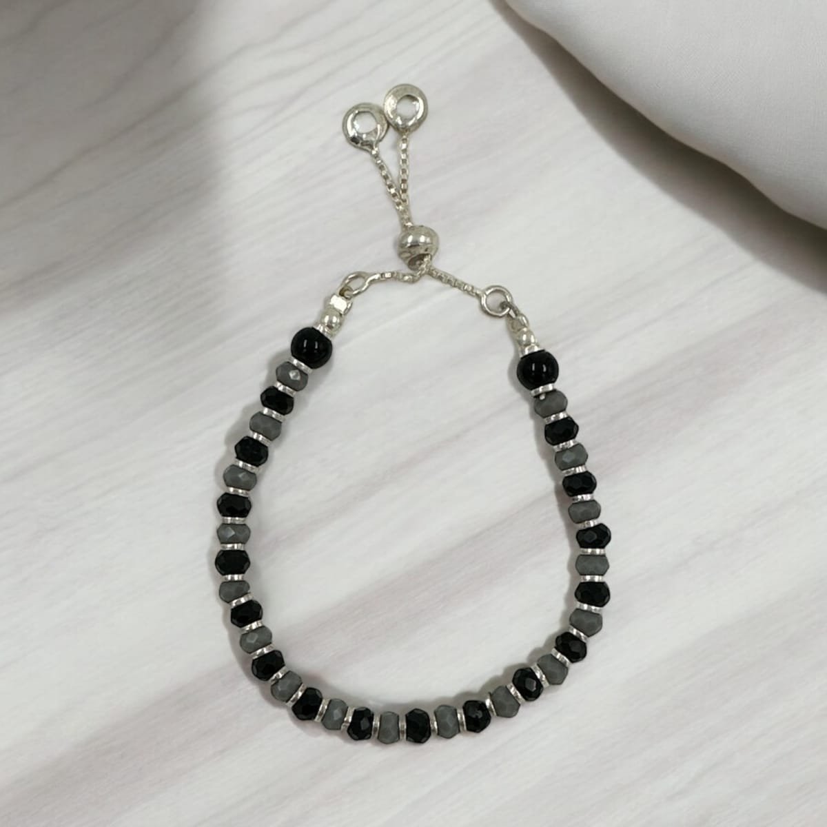 Baby Anklet – Black & Grey Beads with Silver Balls Hangings