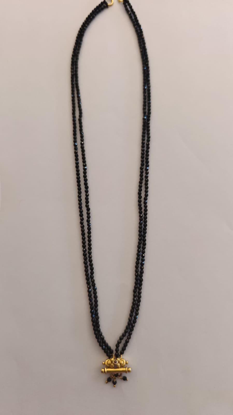 Black beads chain 2 lines  gold polish pendent