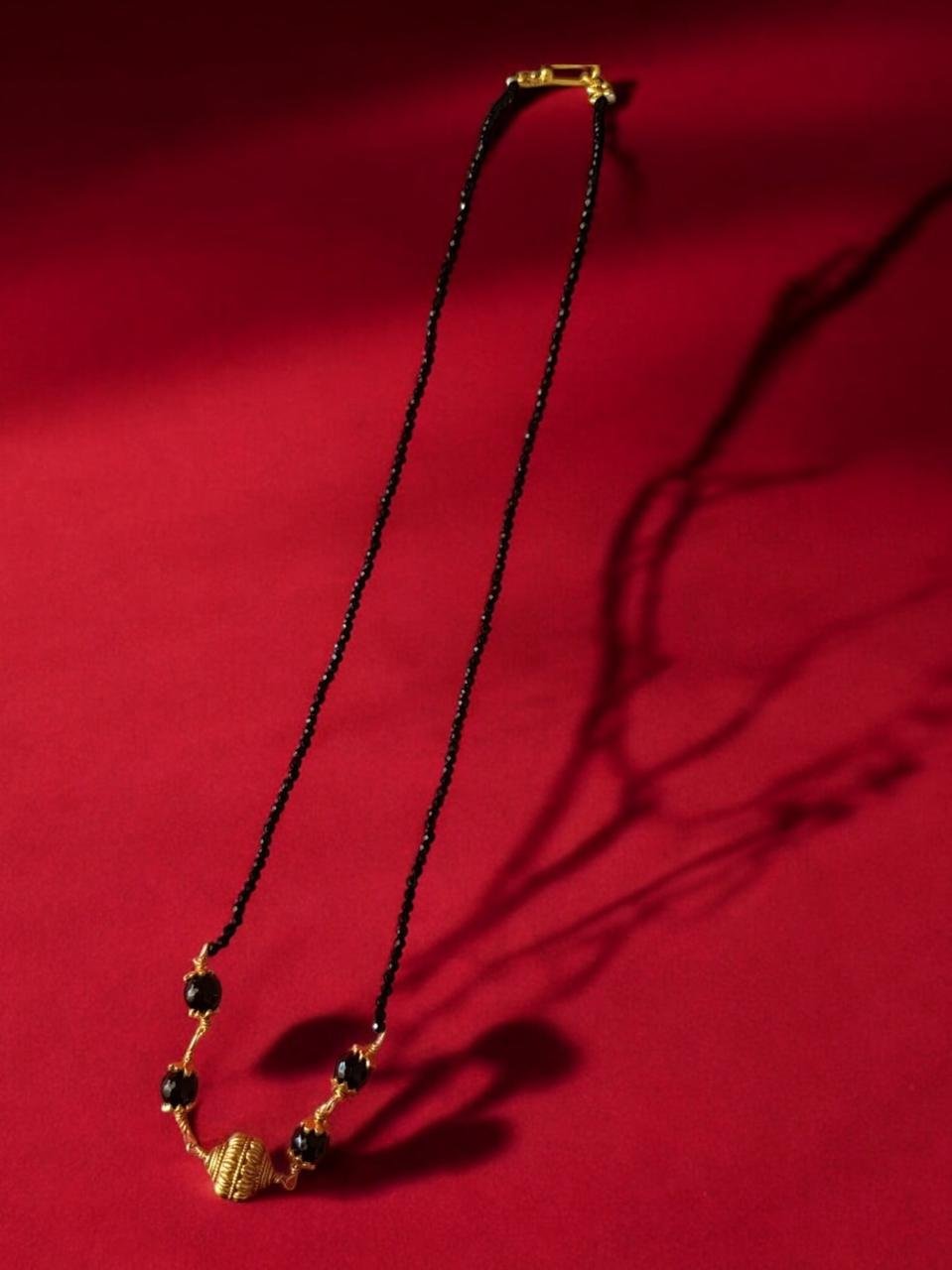 Black beads chain gold  ball pendent with single line