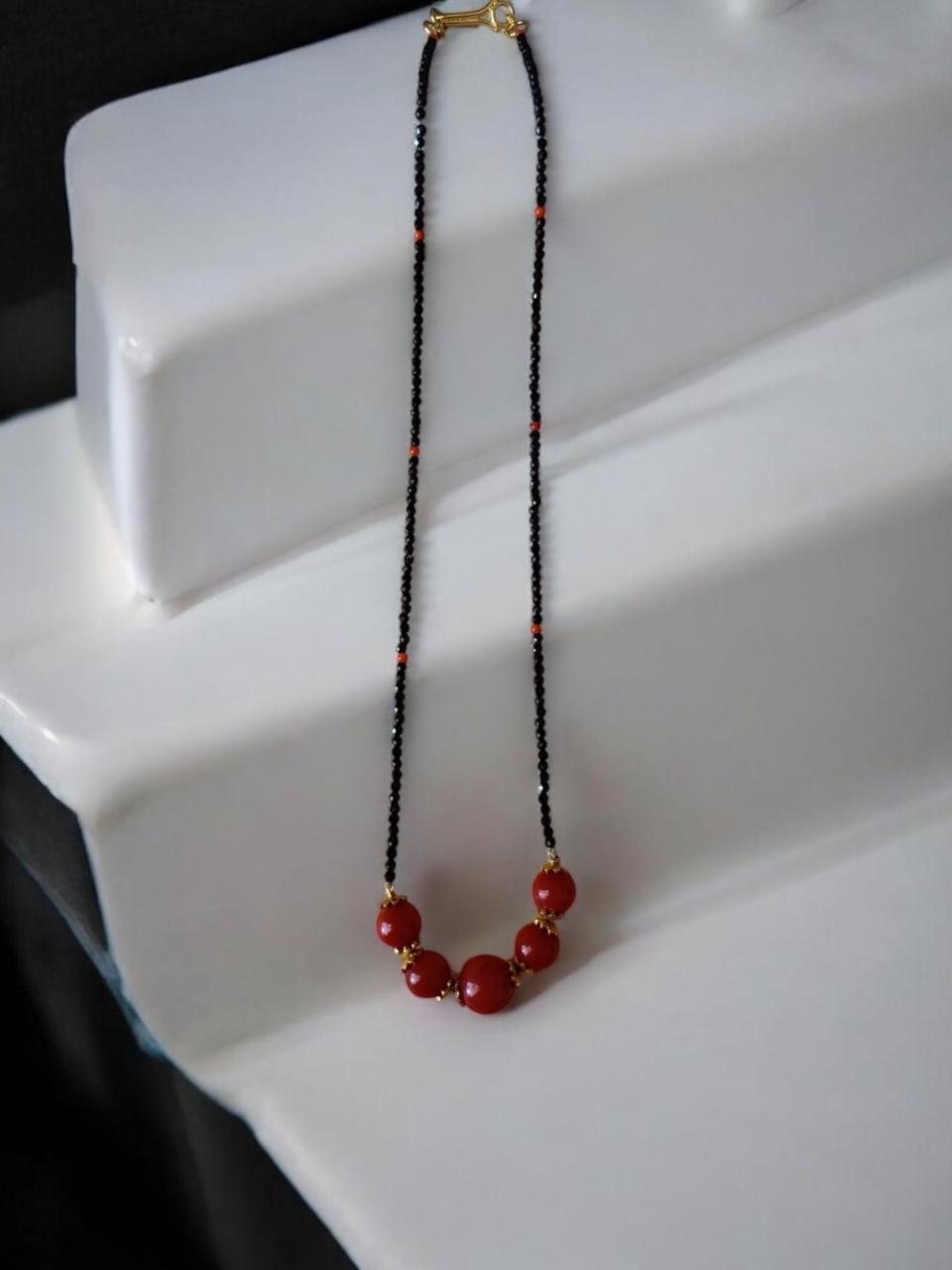 Coral pendant  with black beads chain  single line