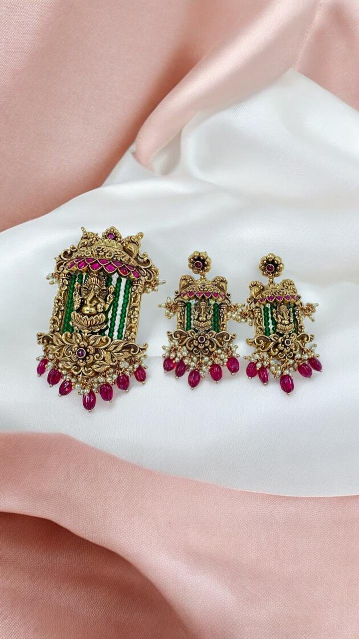 Ganesh modal with gold polish pendent set and ruby stones with ruby  beads hangings