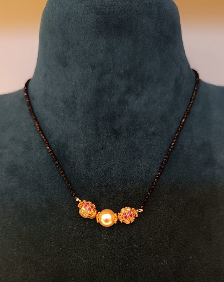 Gold balls  and Swarovski pearl with black beads chain single line