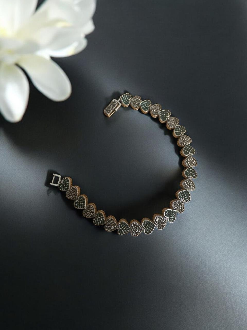 Green and grey stones with silver polish bracelet with marker stones