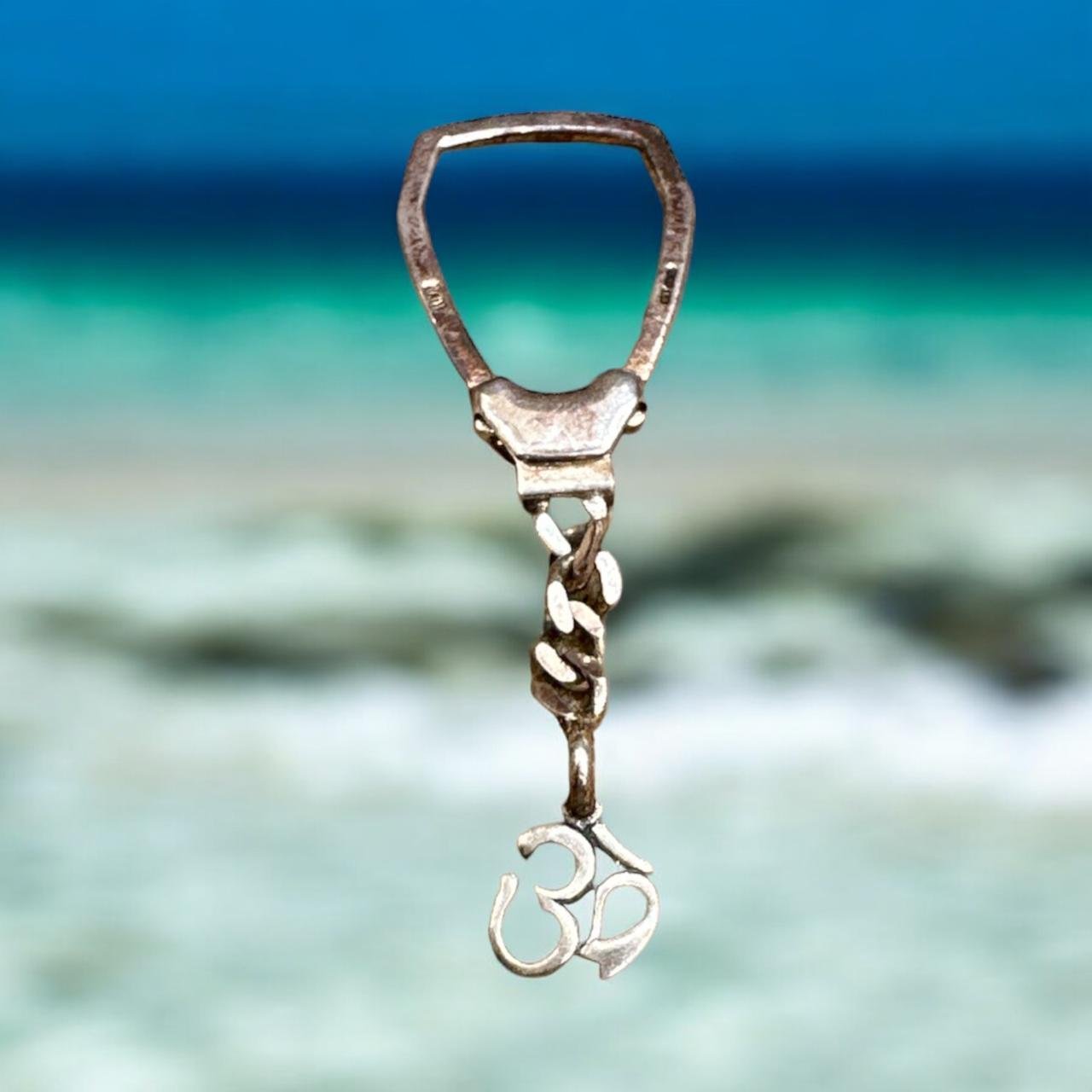 Key chain with om symbol