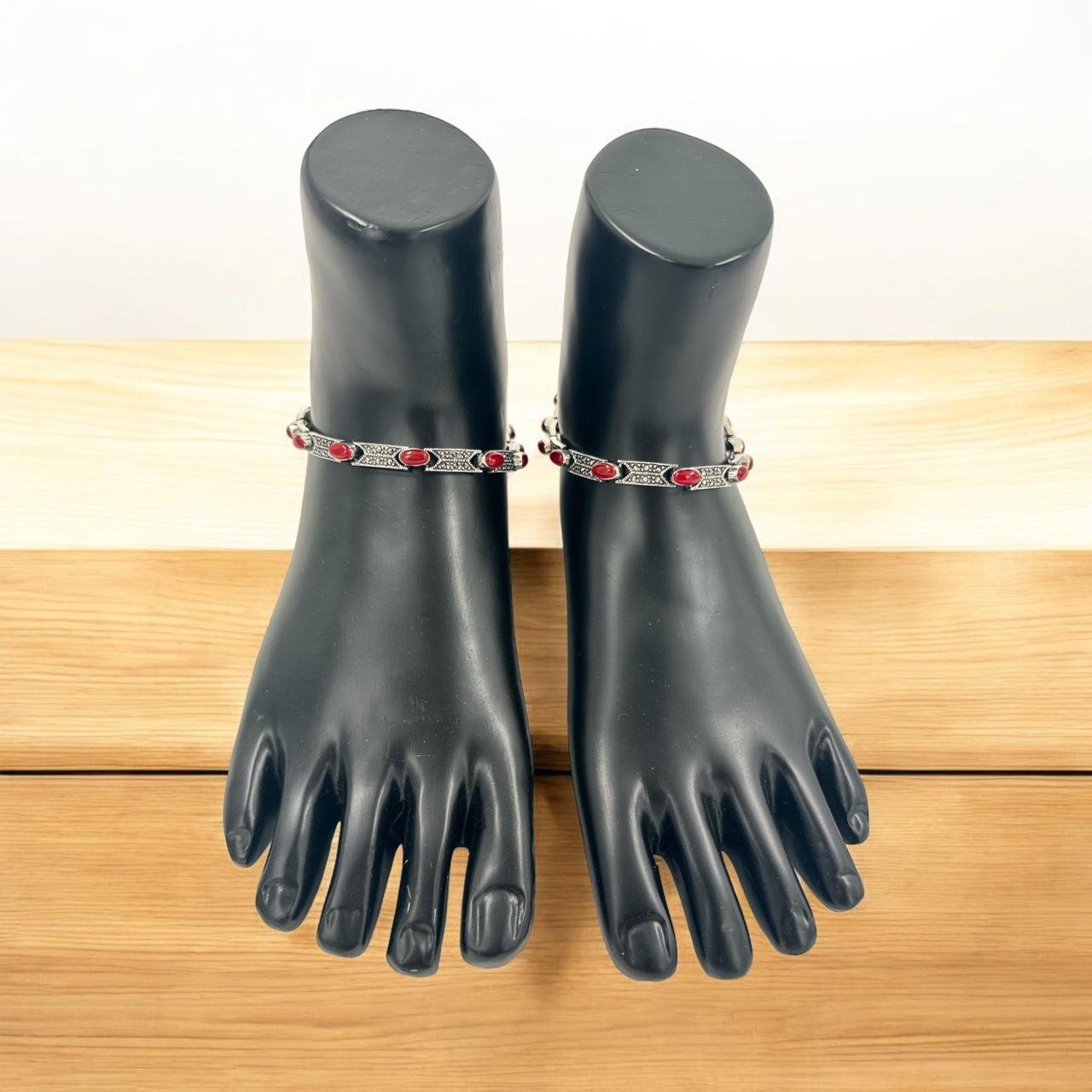 Marker stone with ruby anklets