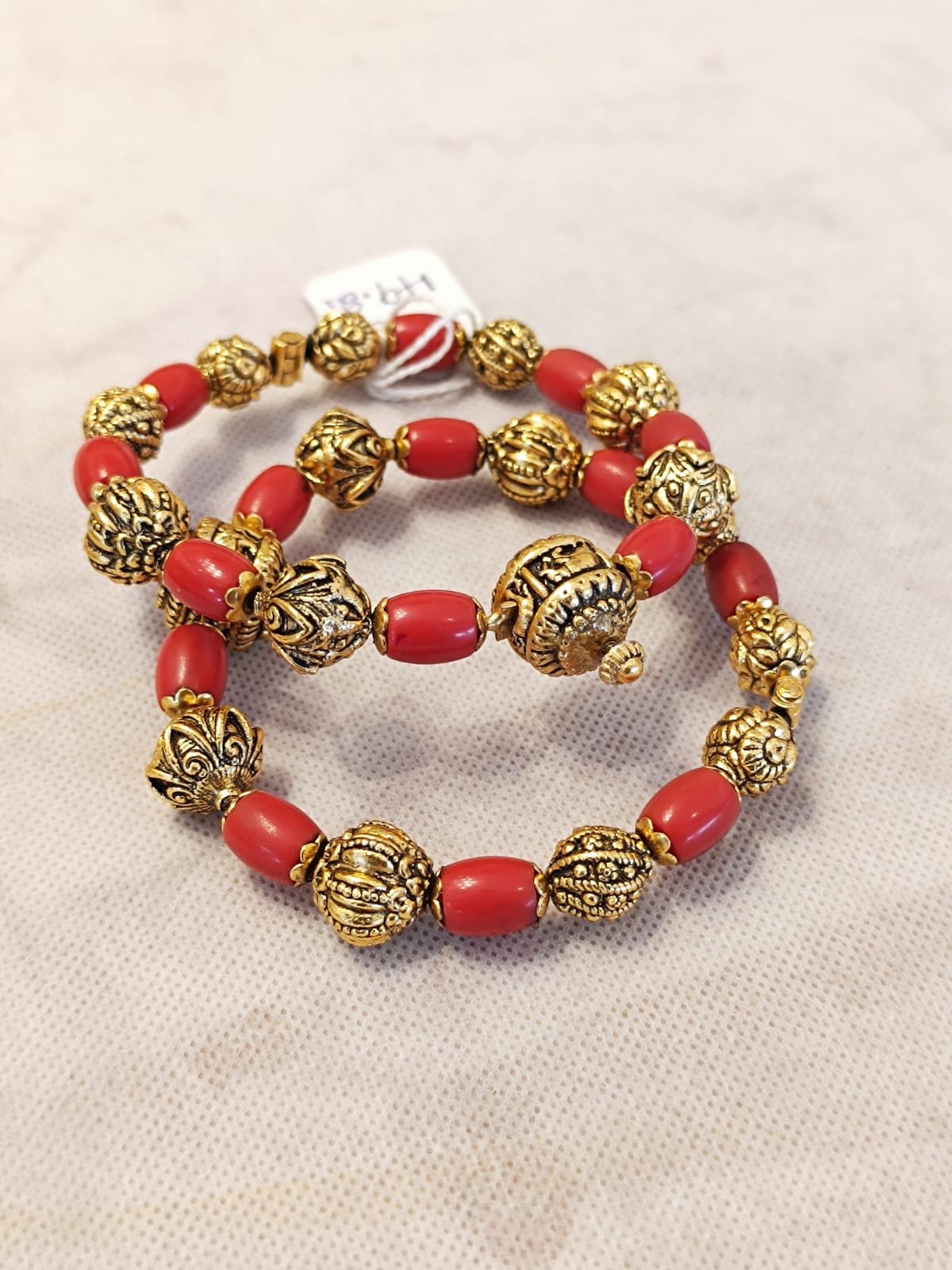 Nakshi balls and corals screw model with gold polish bangle
