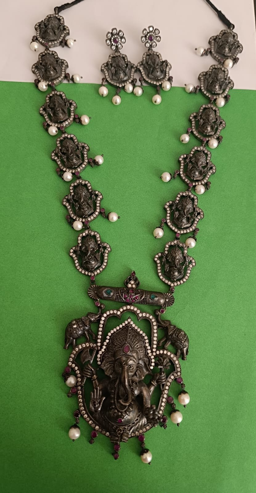Oxidized polish ganesh  pendent  model with haram and earrings