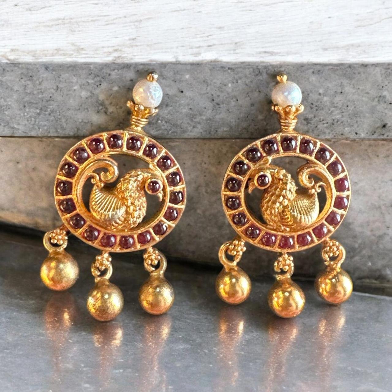 Peacock design earrings with pota stone with gold balls hangings