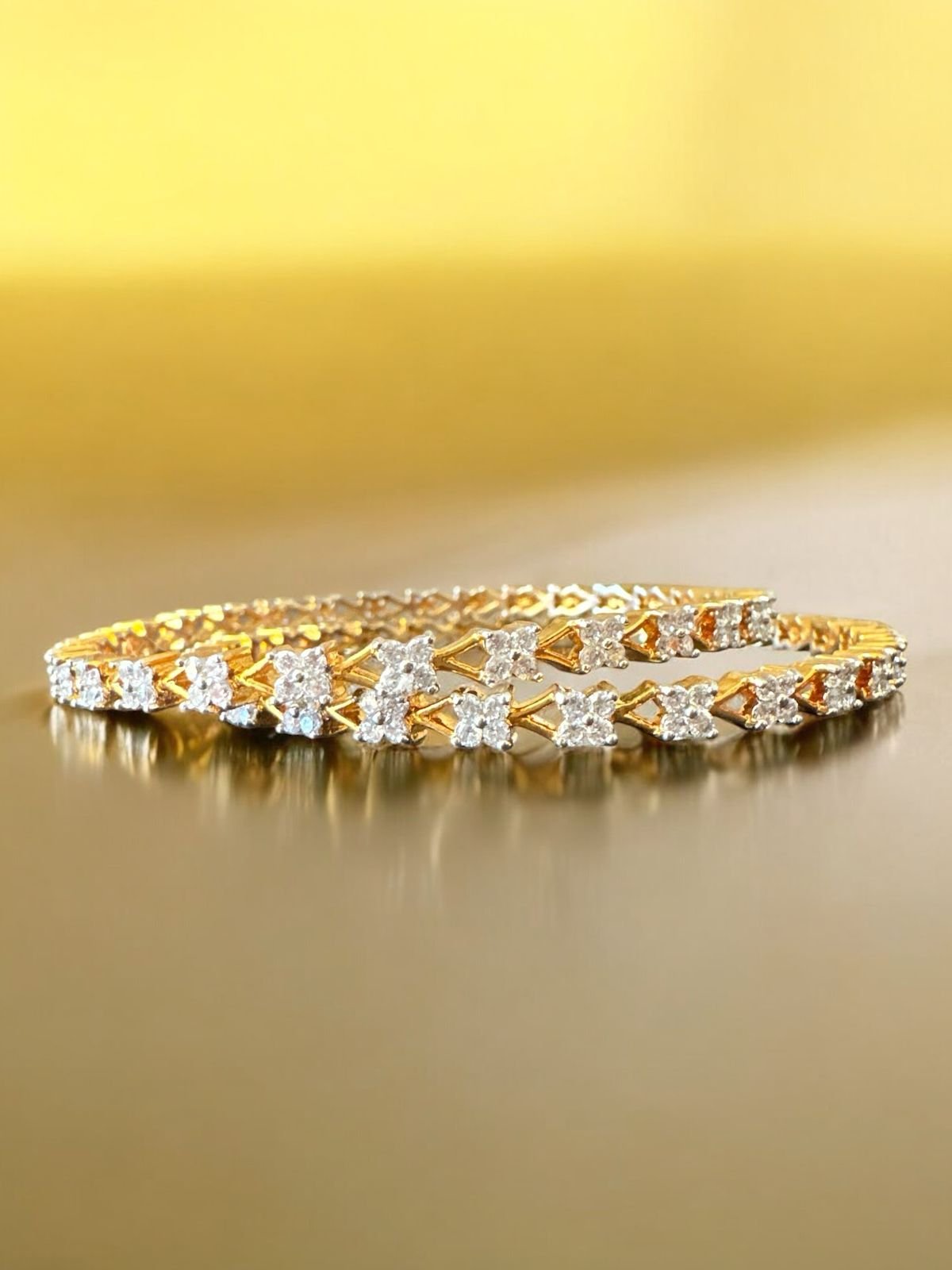 Premium cz stones bangles with gold polish