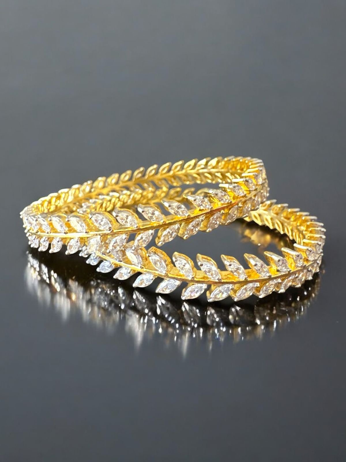 Premium cz stones leaf model bangle with gold polish