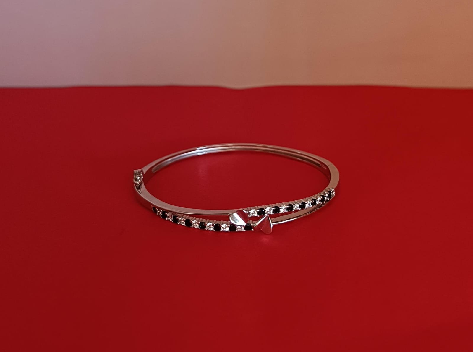 Premium cz stones with silver polish and black and white stones bangle model bracelet