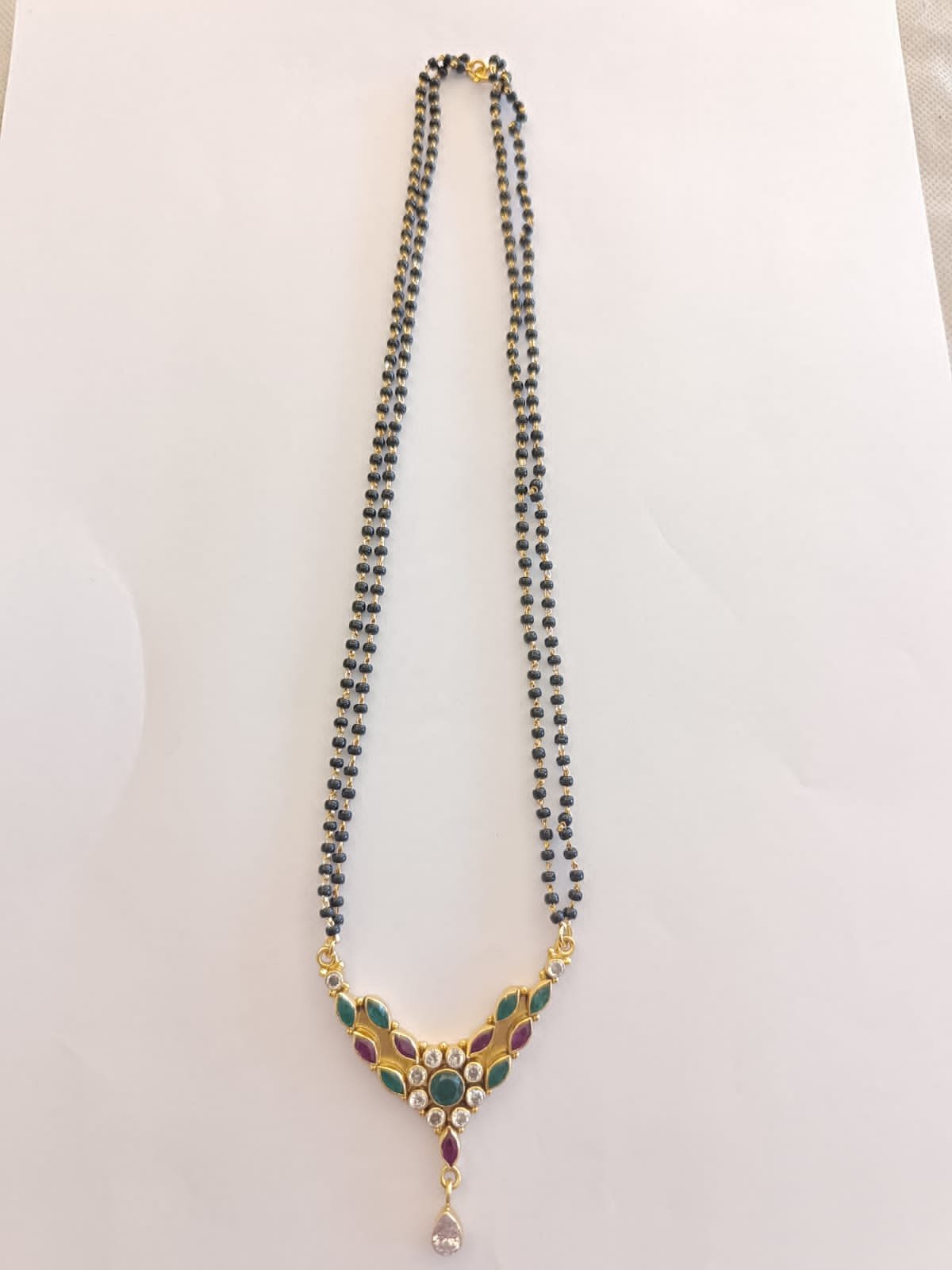 Red and green stones  pendent with  chain 2 lines  gold polish