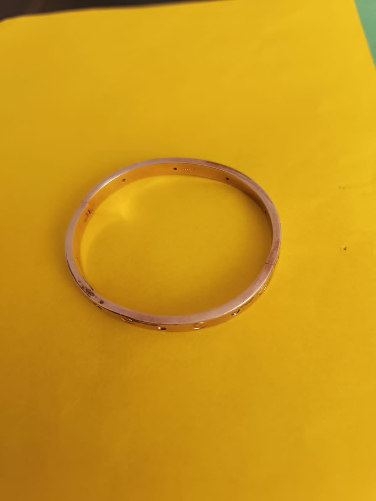 Rose gold polish with bangle model bracelet