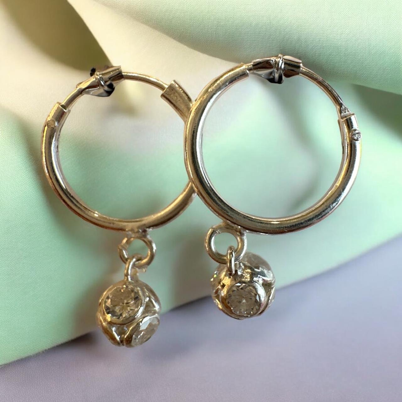 Silver Polish Ring with Hanging Silver Ball