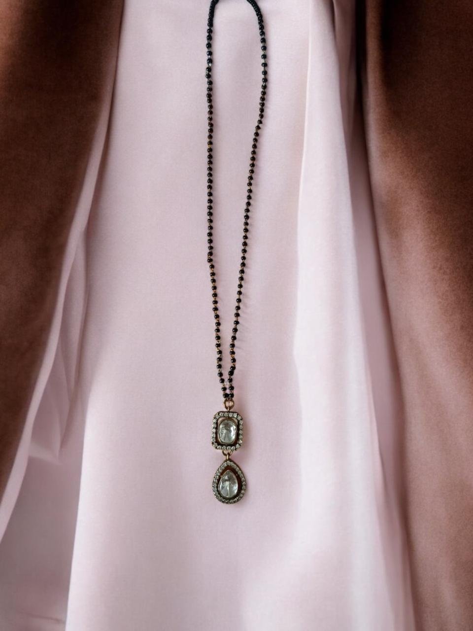 Victoria pendent with single line black beads chain with Victoria Polish